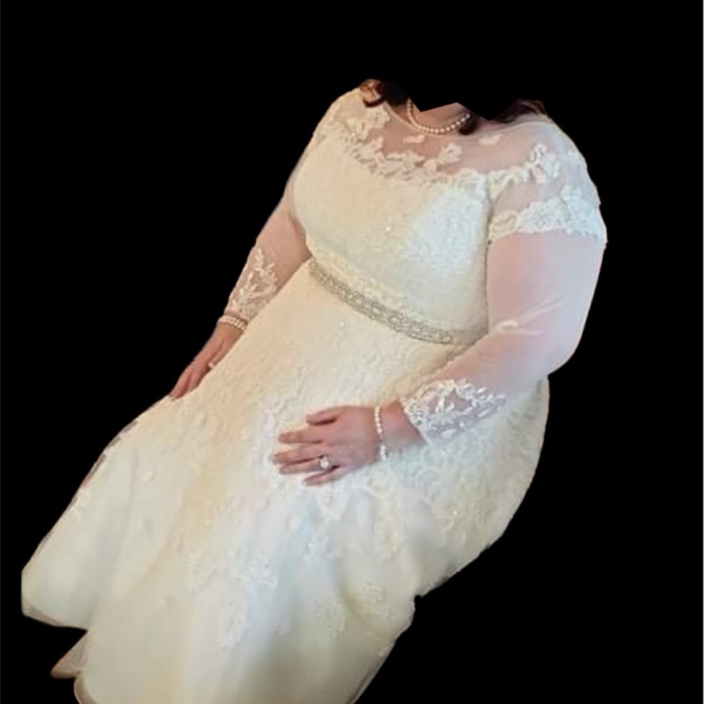 Size 20 Lace and tulle teacup length white wedding dress.